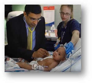 Dr. Kaushal with pediatric patient