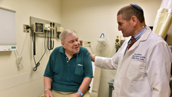 Dr. Aaron Rapoport with patient